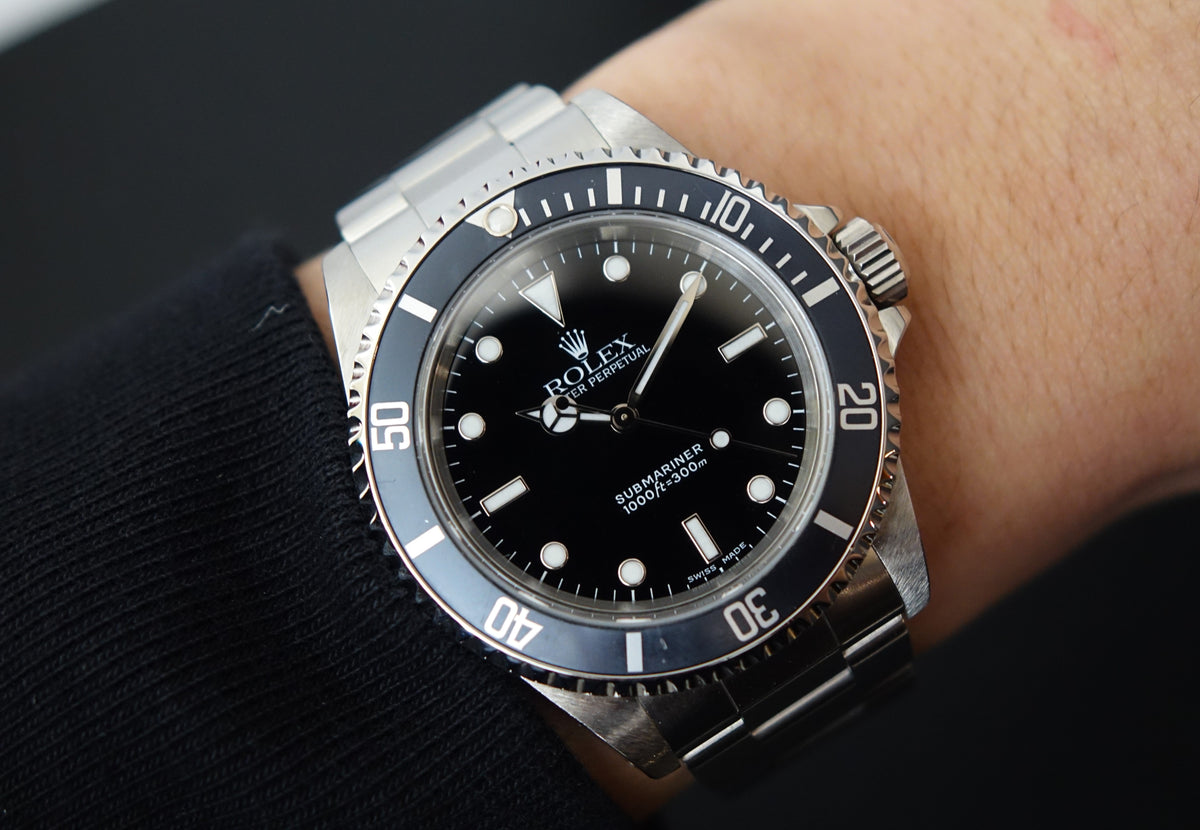 Rolex Submariner 14060 Faded Ghost bezel