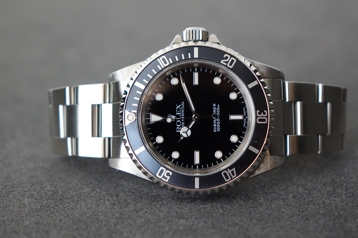 Rolex Submariner 14060 Faded Ghost bezel