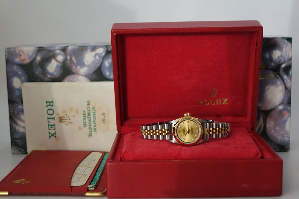 Rolex Oyster Perpetual Datejust 26 67193 half gold diamond champagne dial