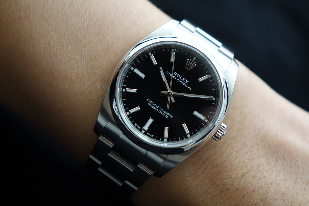 Rolex Oyster Perpetual 114200 black dial