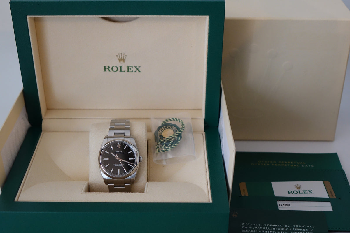 Rolex Oyster Perpetual 114200 black dial