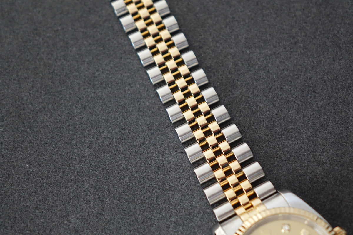 Rolex Datejust 36 116233G champagne dial 10pt diamonds