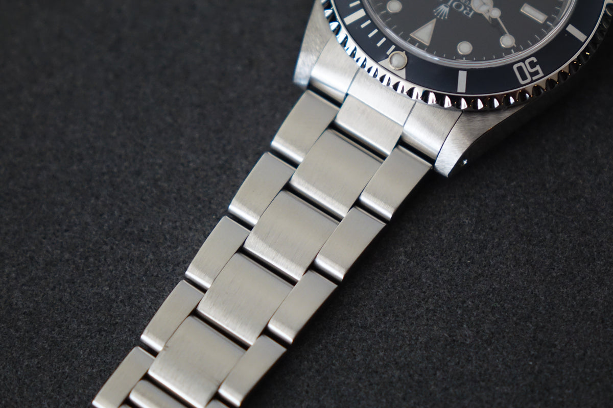 Rolex Submariner 14060 Faded Ghost bezel